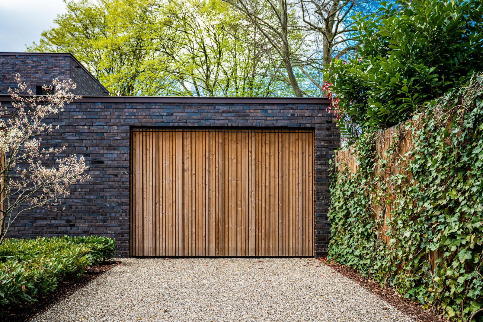 Organized home garage with driveway