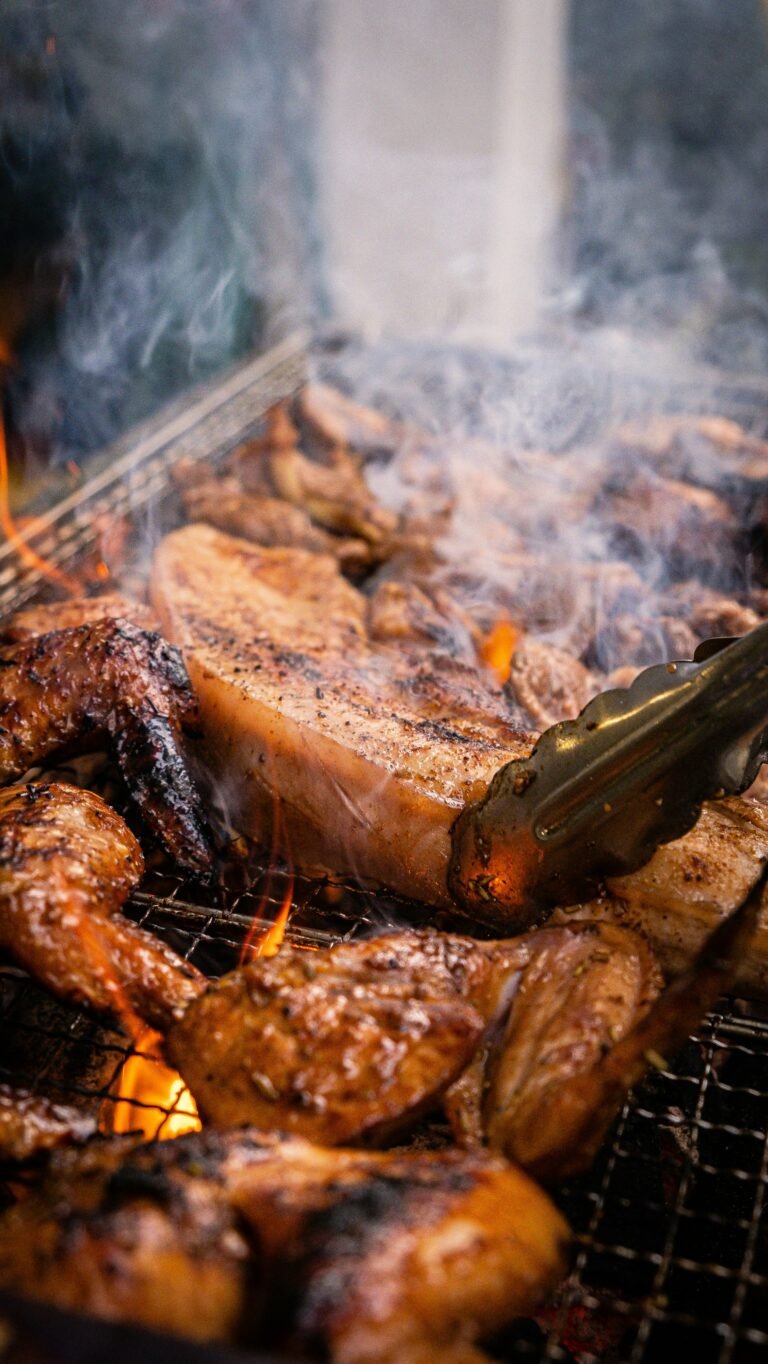 Grilled meat on a charcoal grill